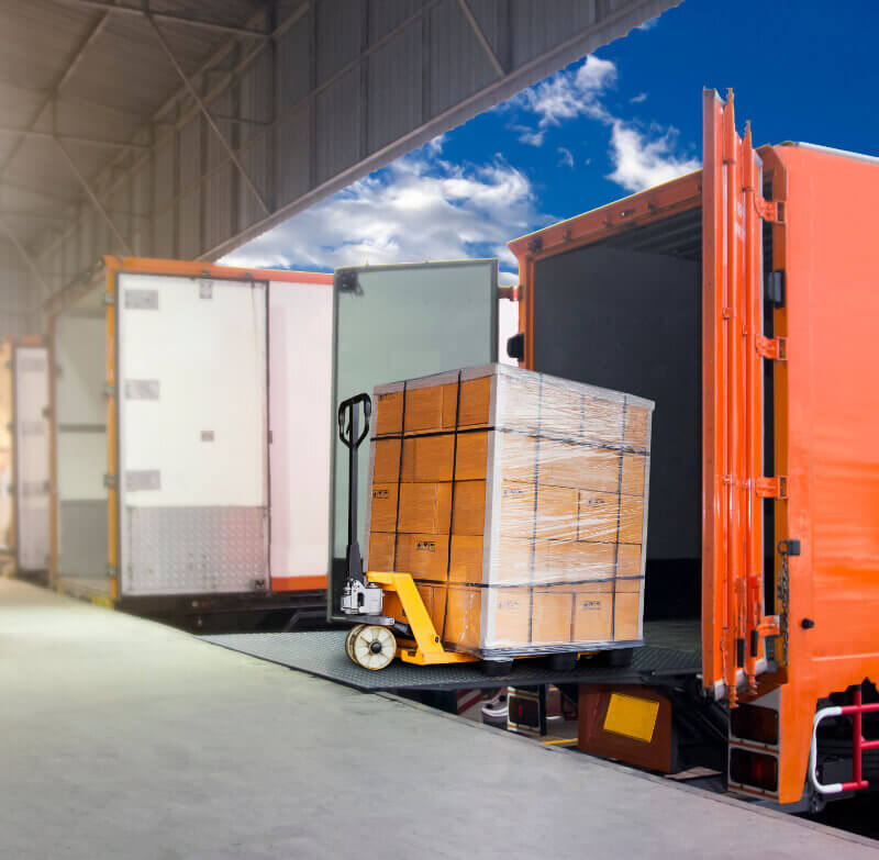 Unloading a pallette of boxes from a truck