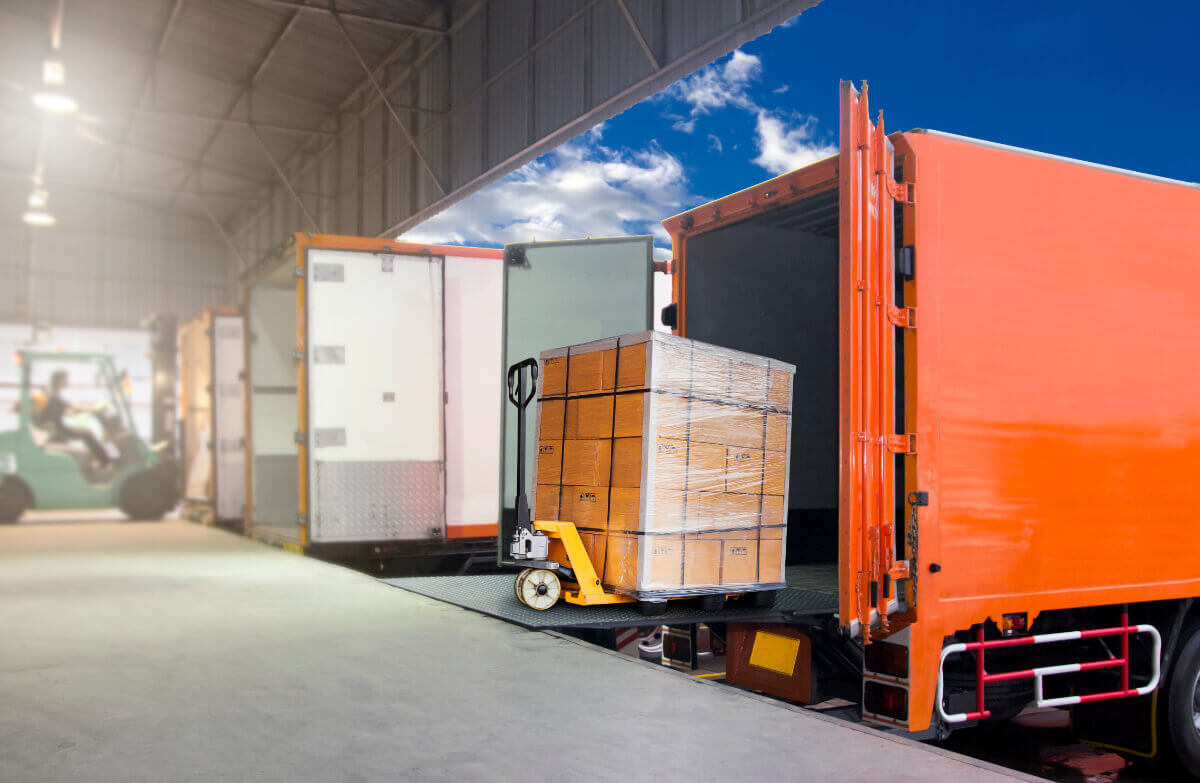 Unloading a pallette of boxes from a truck