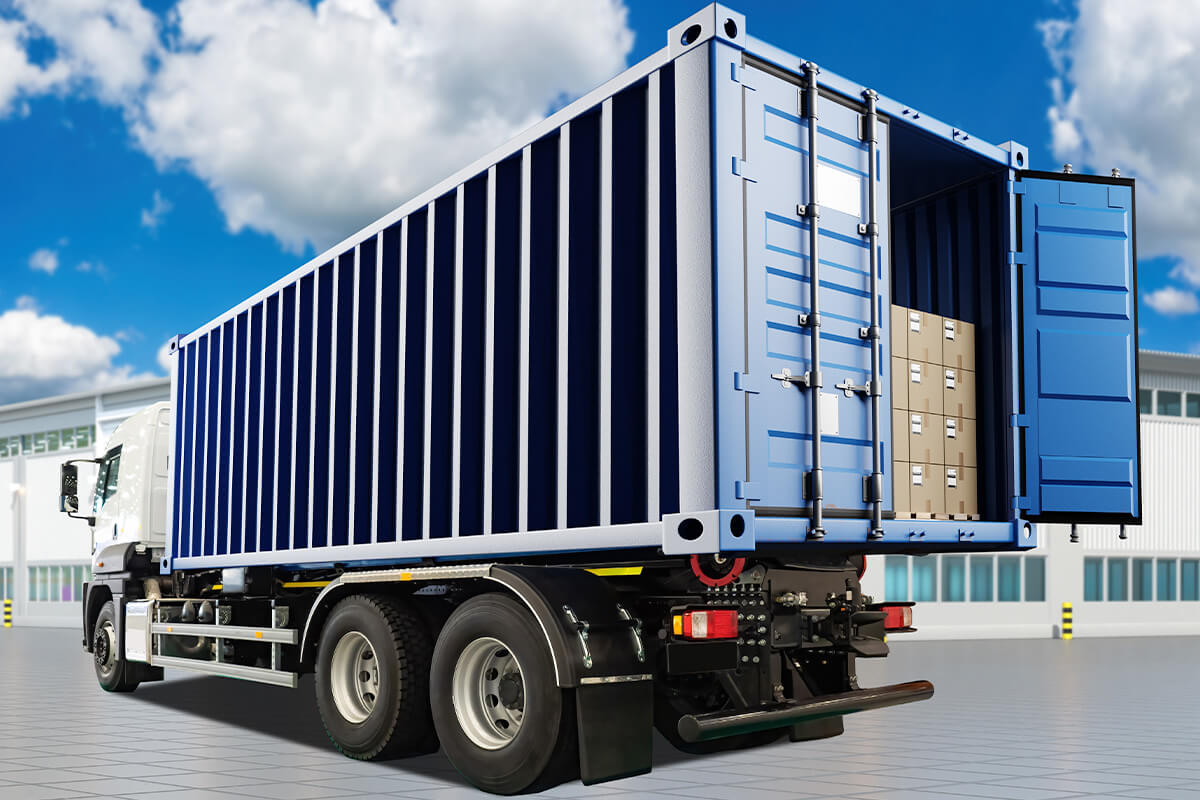 trucks with blue colored container has door open with pallet of boxes visible inside